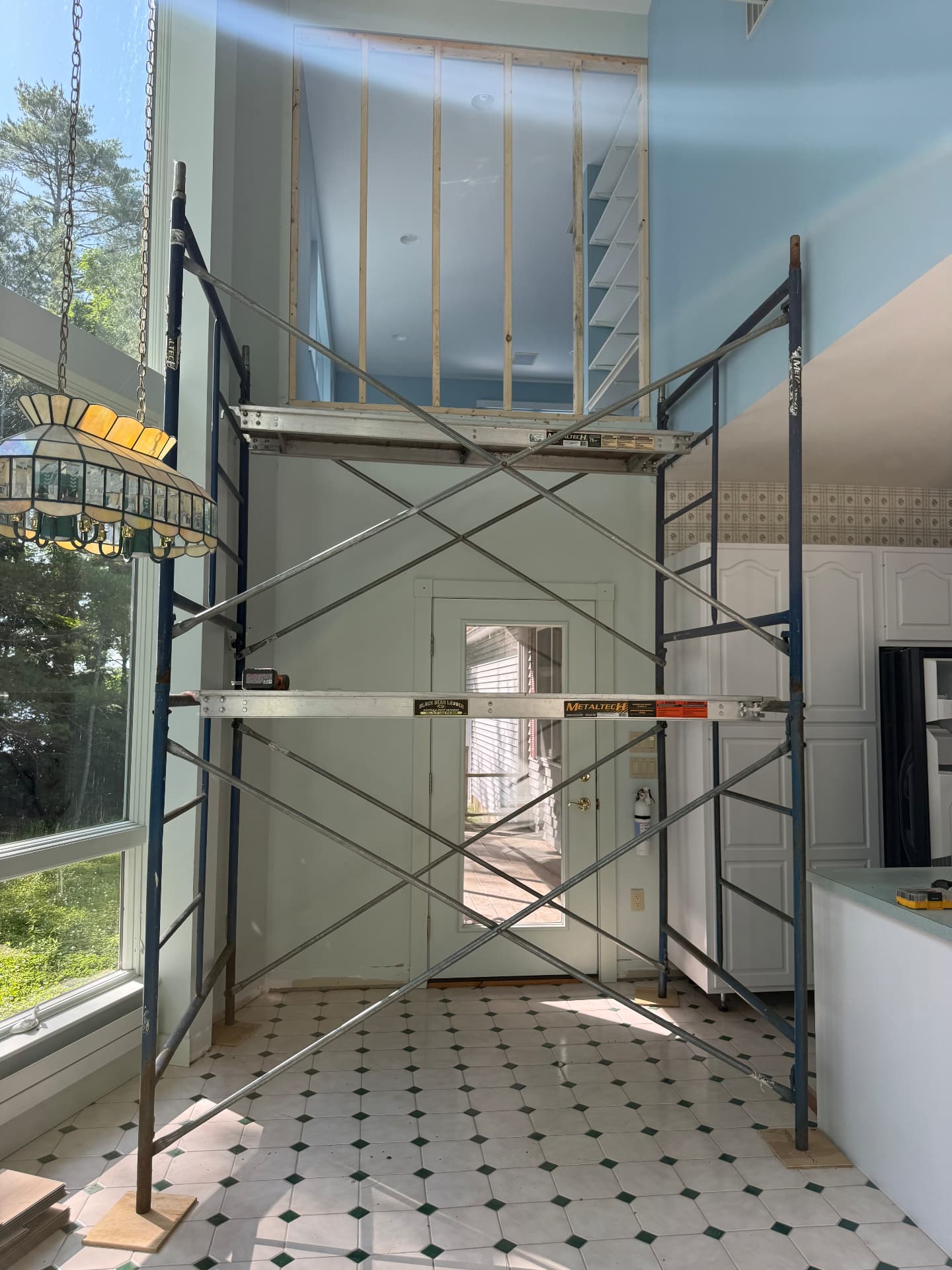 Interior scaffolding set up for high ceiling renovation work